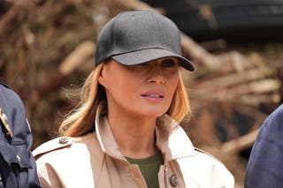First lady Melania Trump stands while greeting first responders as she observes flood damage in Kerrville, Texas